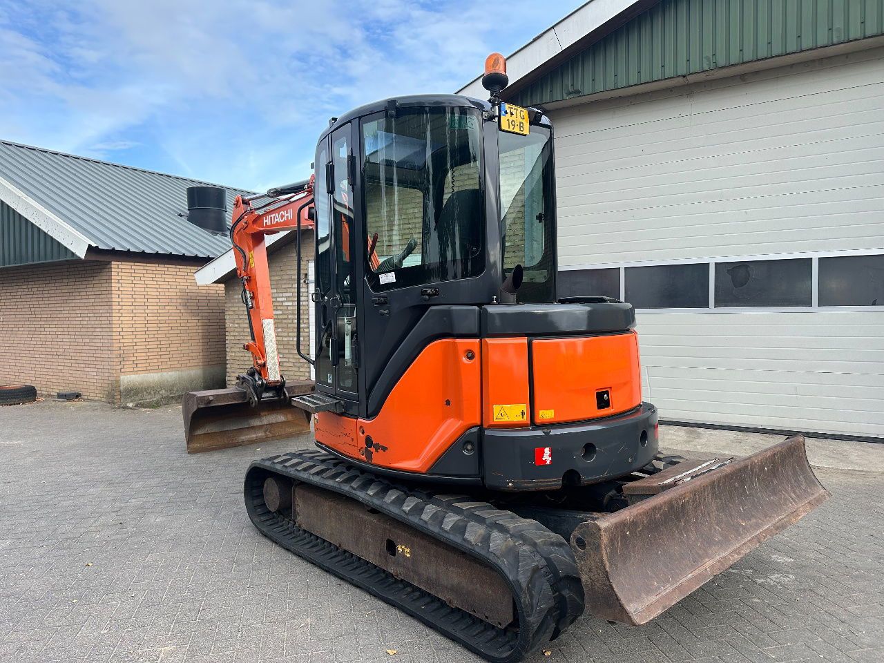 2011 Hitachi ZX52U-3 CLR mini excavator, rear three-quarter view 2011 Hitachi ZX52U-3 CLR mini excavator, rear three-quarter view