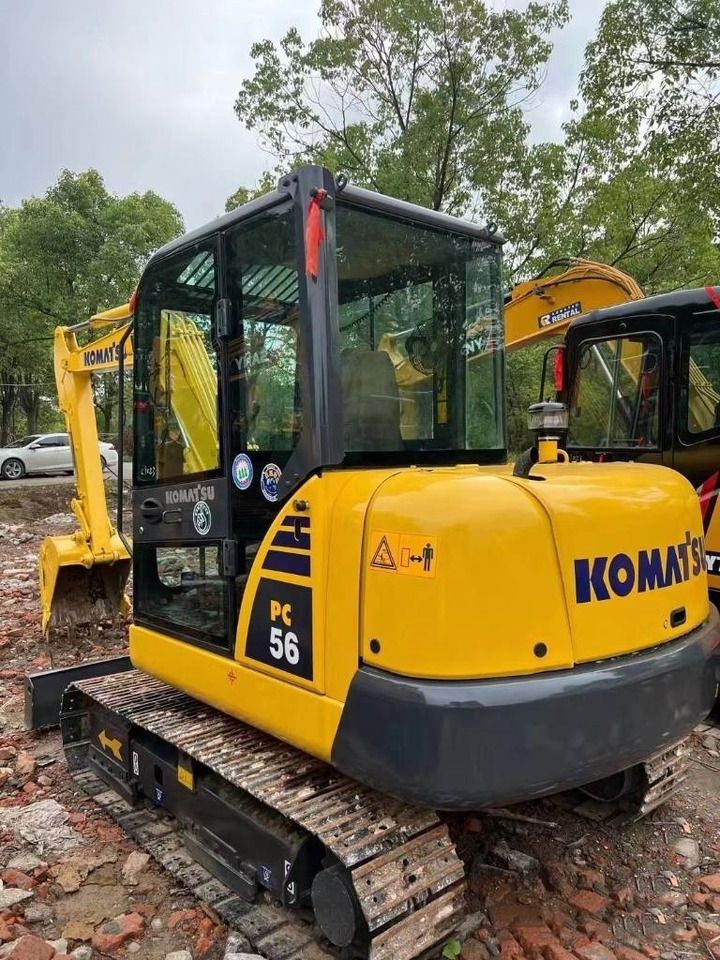 2022 Komatsu PC56-7 mini excavator, rear three-quarter view 2022 Komatsu PC56-7 mini excavator, rear three-quarter view