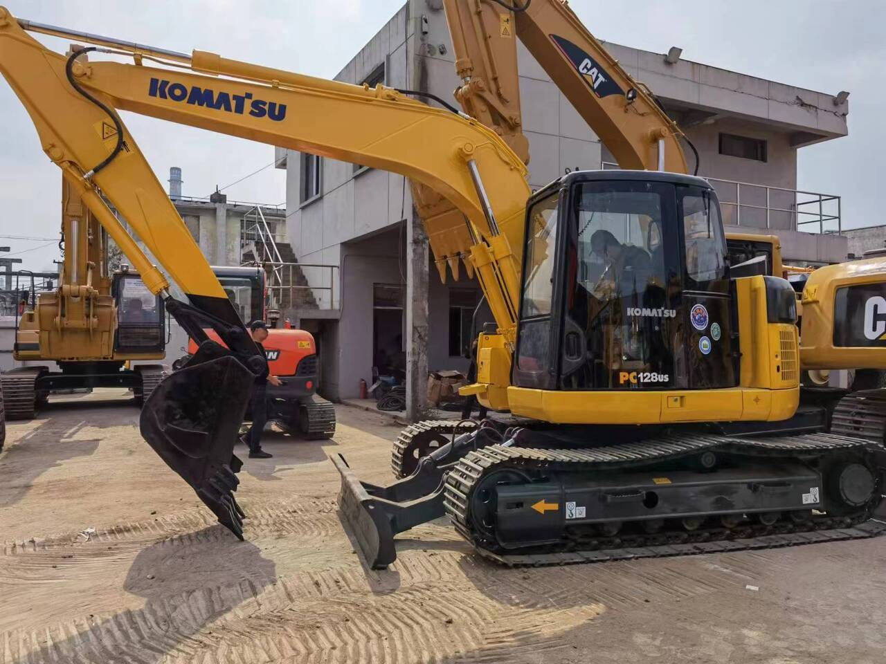 2018 Komatsu PC128US mini excavator, side view 2018 Komatsu PC128US mini excavator, side view
