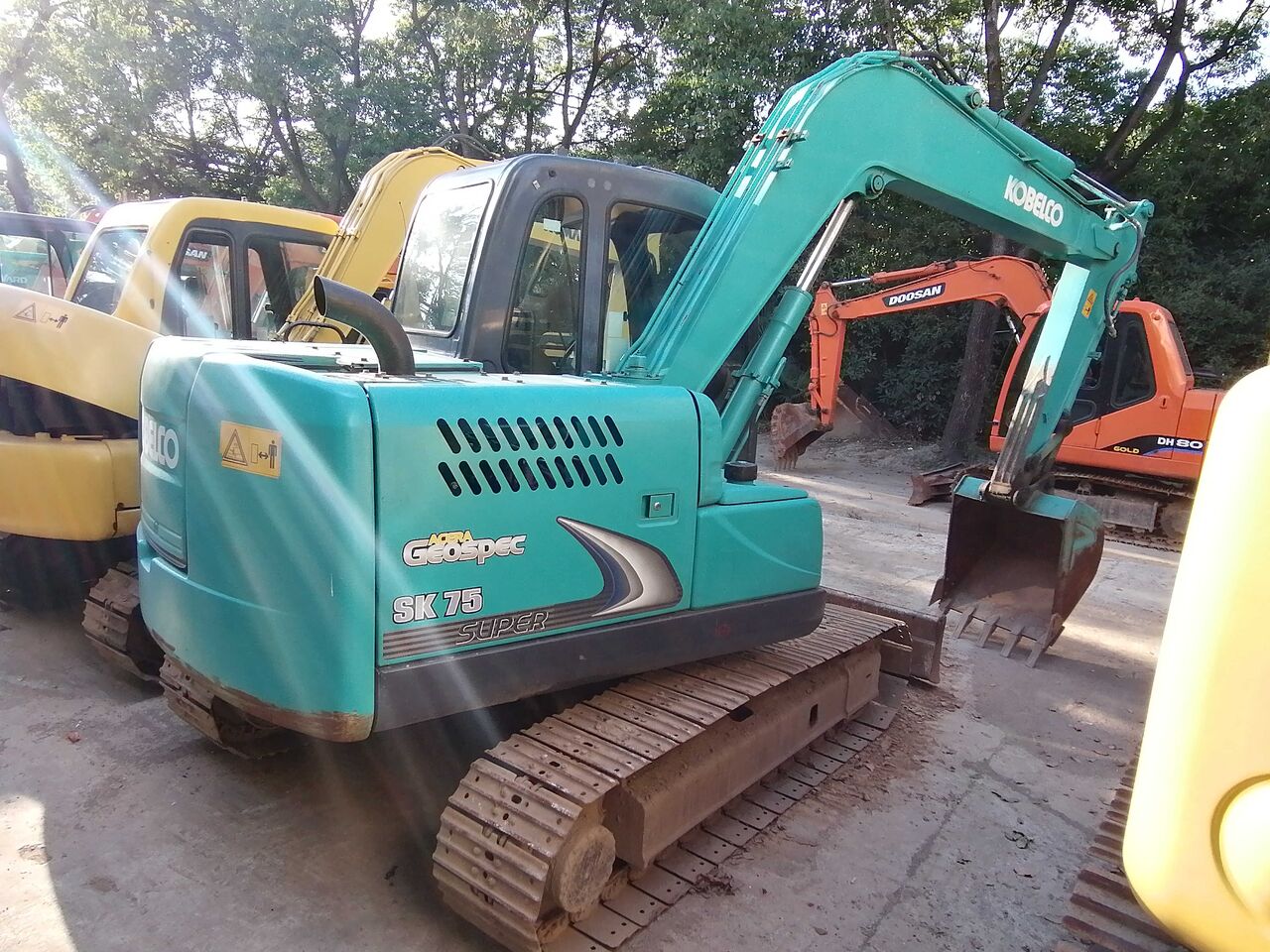 2024 Kobelco SK75-8 excavator, rear three-quarter view
