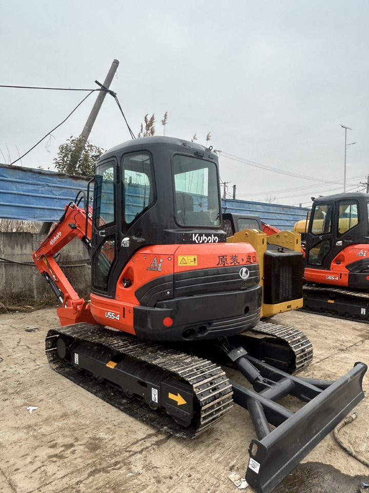 2022 Kubota U55-4 mini excavator, front three-quarter view 2022 Kubota U55-4 mini excavator, front three-quarter view