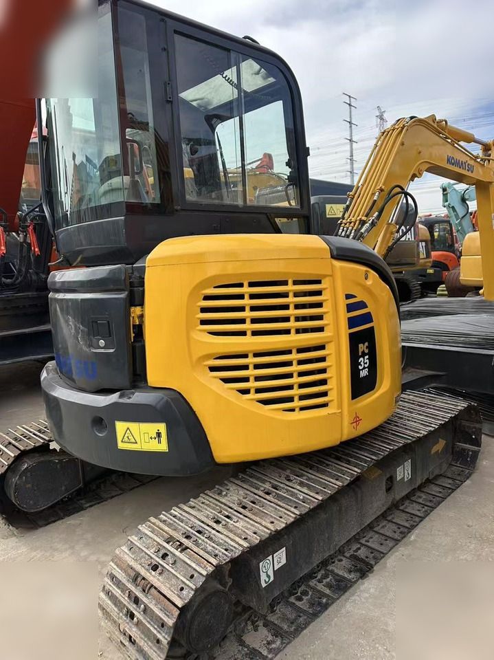 2024 Komatsu PC35MR-2 mini excavator, rear three-quarter view 2024 Komatsu PC35MR-2 mini excavator, rear three-quarter view
