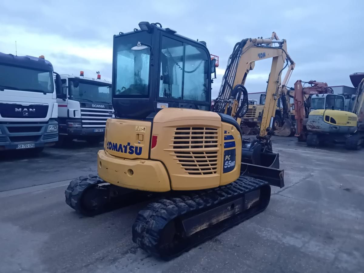 2018 Komatsu PC-55MR mini excavator, rear three-quarter view 2018 Komatsu PC-55MR mini excavator, rear three-quarter view