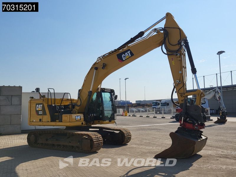 2019 Caterpillar 323 crawler excavator, rear three-quarter view