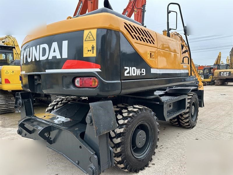 2020 Hyundai 210W-9 wheeled excavator, rear three-quarter view