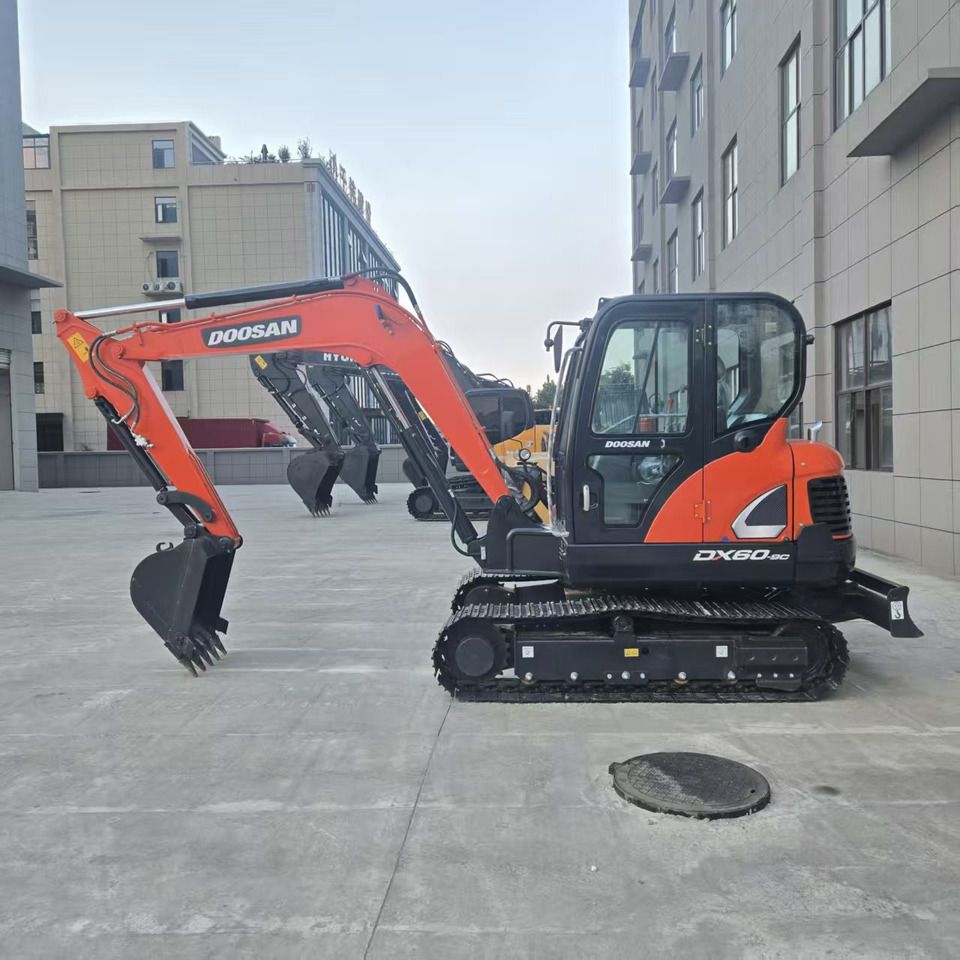 2024 Doosan DX60-9C mini excavator side view 2024 Doosan DX60-9C mini excavator side view