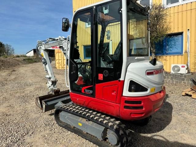 2025 Takeuchi TB230 V3 mini excavator, rear three-quarter view 2025 Takeuchi TB230 V3 mini excavator, rear three-quarter view