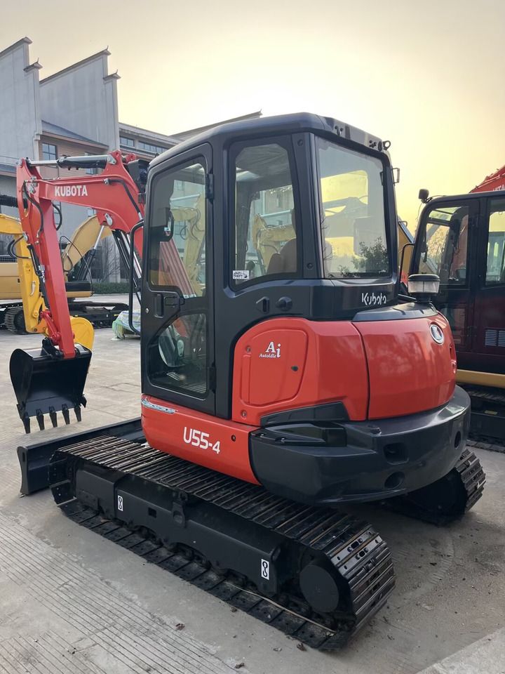 2022 Kubota U55-4 mini excavator, front three-quarter view 2022 Kubota U55-4 mini excavator, front three-quarter view