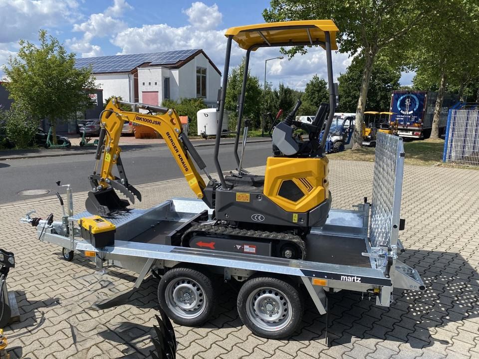Berger Kraus BK1000JSR mini excavator on trailer, side view Berger Kraus BK1000JSR mini excavator on trailer, side view