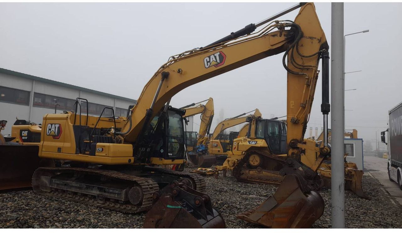 2021 Caterpillar 320-07 crawler excavator, side profile view