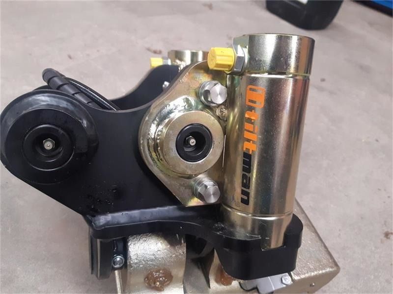 Tiltman mini excavator tilt rotator attachment close-up