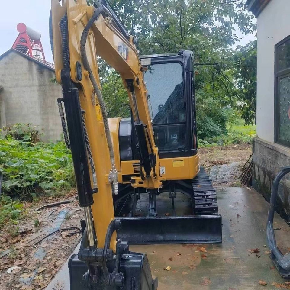 2022 Caterpillar 303.5ECR mini excavator front view 2022 Caterpillar 303.5ECR mini excavator front view