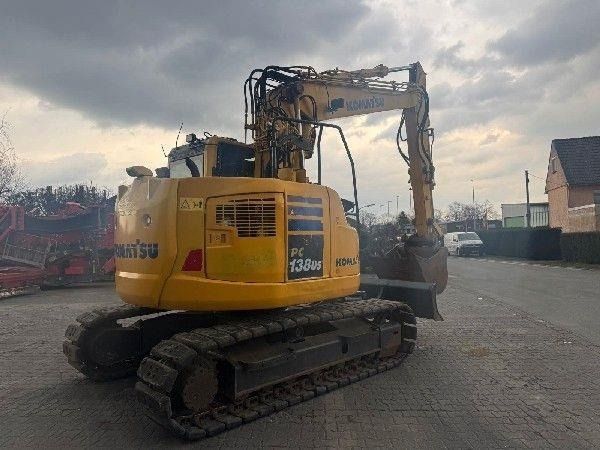 2015 Komatsu PC138US-10 crawler excavator, rear three-quarter view 2015 Komatsu PC138US-10 crawler excavator, rear three-quarter view