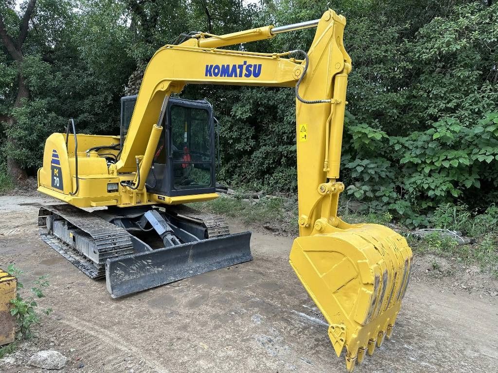 2024 Komatsu PC70-8 mini excavator, rear three-quarter view