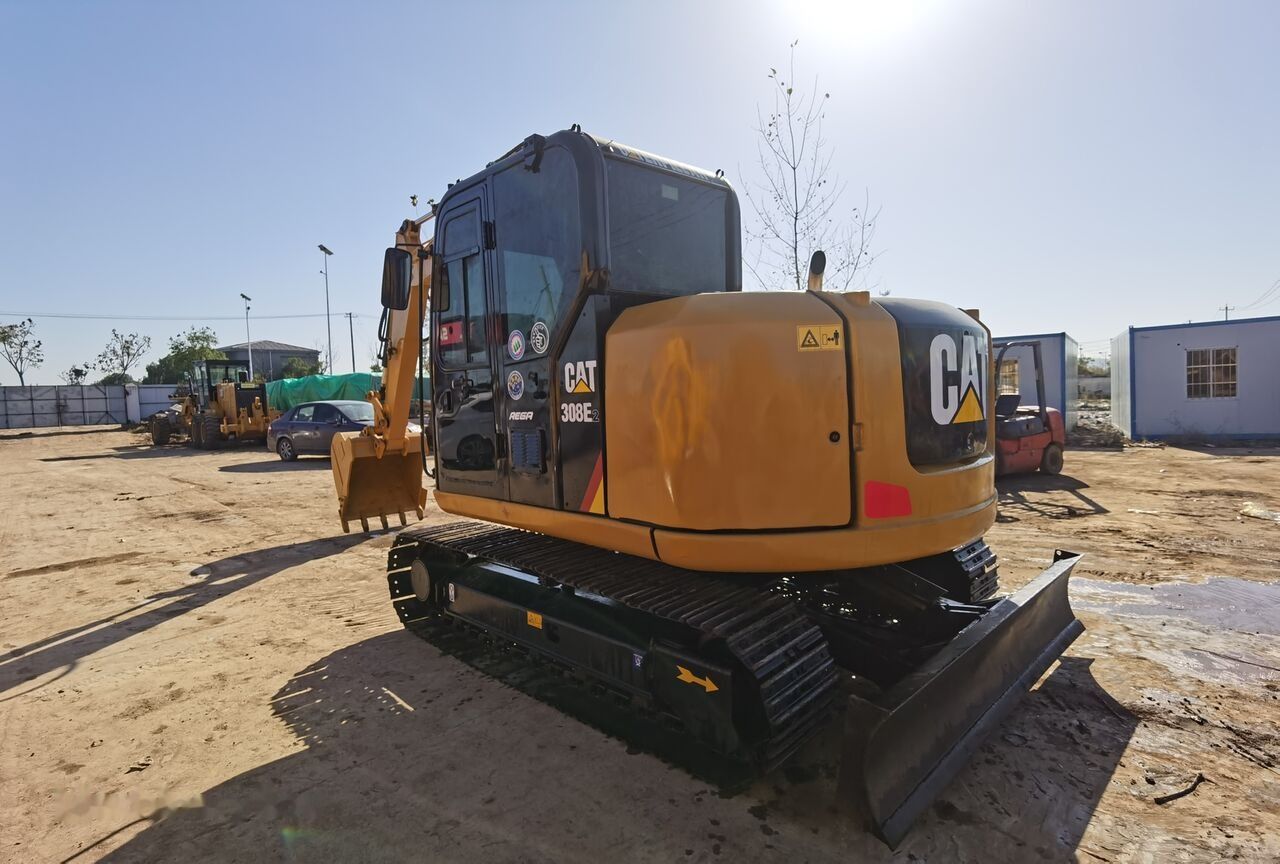 2020 Caterpillar 308E2 mini excavator, rear three-quarter view 2020 Caterpillar 308E2 mini excavator, rear three-quarter view