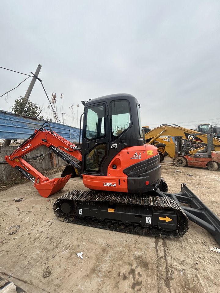 2022 Kubota U55-4 mini excavator, side view 2022 Kubota U55-4 mini excavator, side view