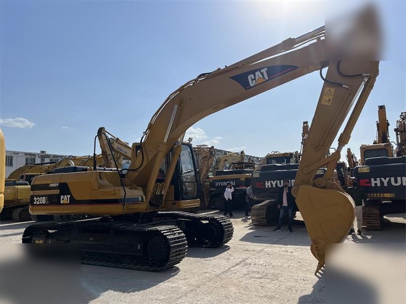 2012 Caterpillar 320BL crawler excavator, side profile view 2012 Caterpillar 320BL crawler excavator, side profile view