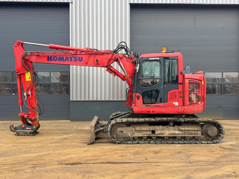 2017 Komatsu PC138US-11 crawler excavator, side view