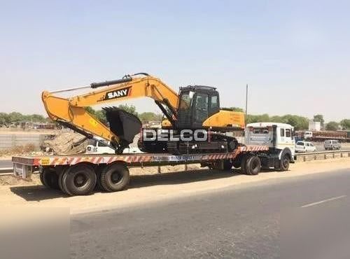 2026 Sany SY210 LC crawler excavator on a flatbed trailer, side view 2026 Sany SY210 LC crawler excavator on a flatbed trailer, side view