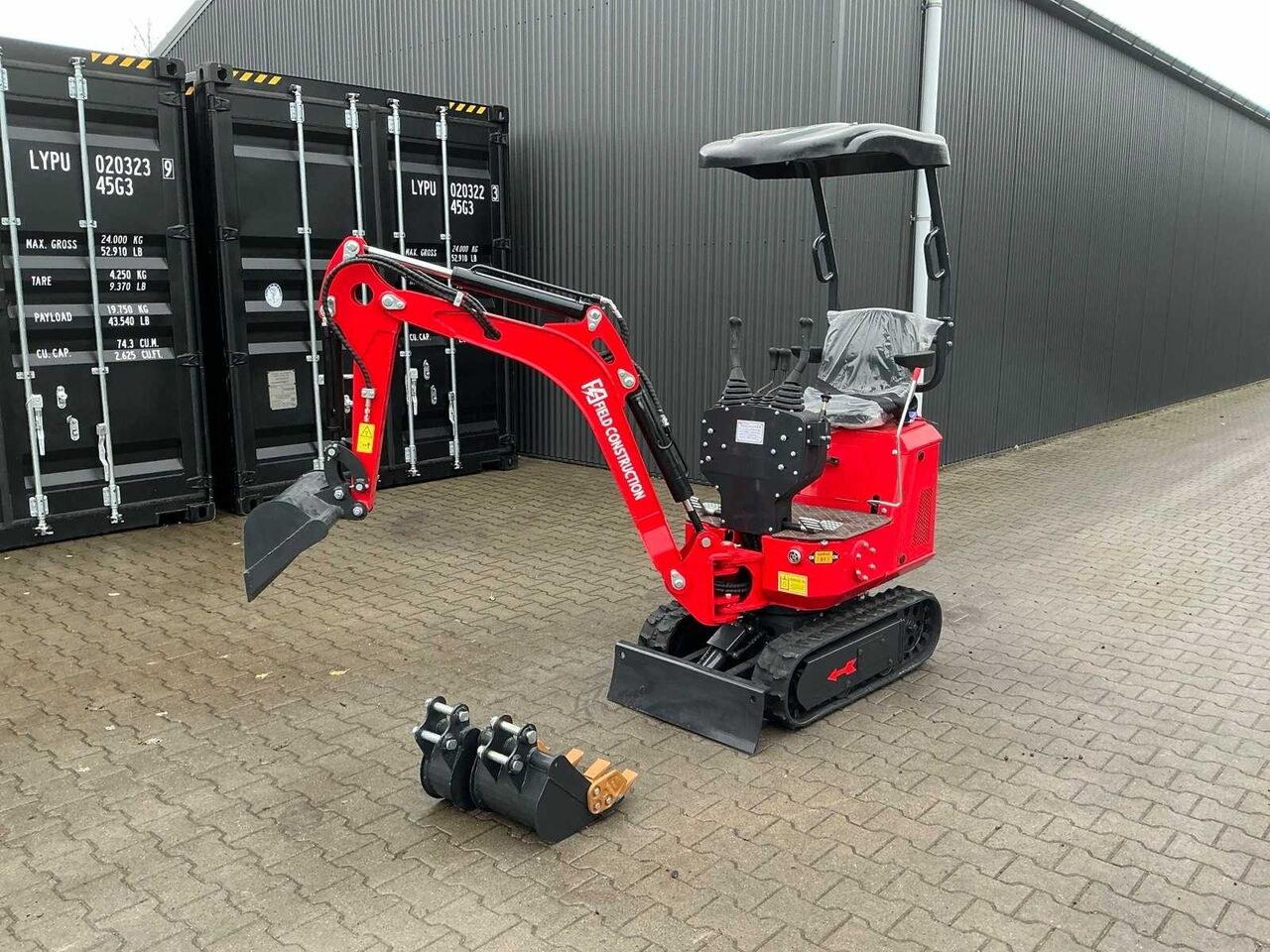 Field Construction HFT12 mini excavator, front three-quarter view Field Construction HFT12 mini excavator, front three-quarter view