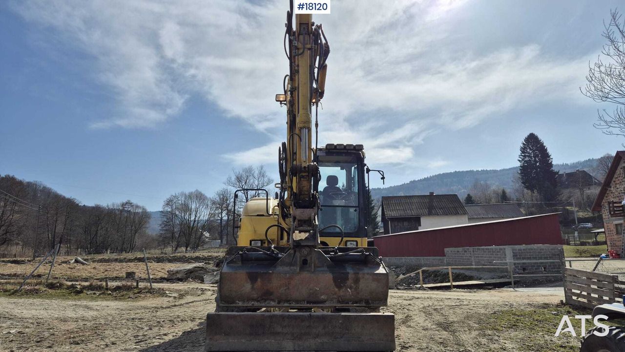 2013 Komatsu PW118 MR-8 wheel excavator, front view 2013 Komatsu PW118 MR-8 wheel excavator, front view