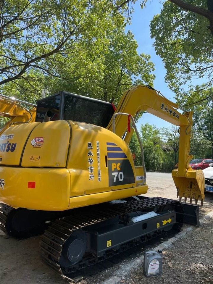 2024 Komatsu PC70-8 mini excavator, rear three-quarter view