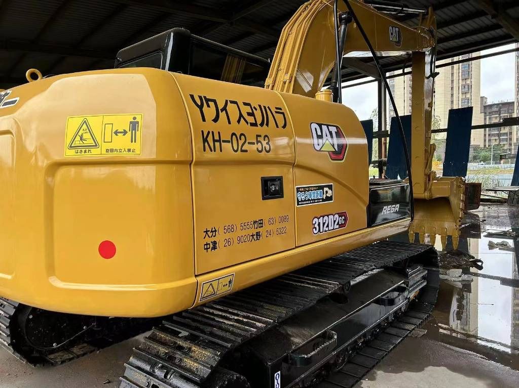 2023 Caterpillar 312D2 GC crawler excavator rear three-quarter view 2023 Caterpillar 312D2 GC crawler excavator rear three-quarter view