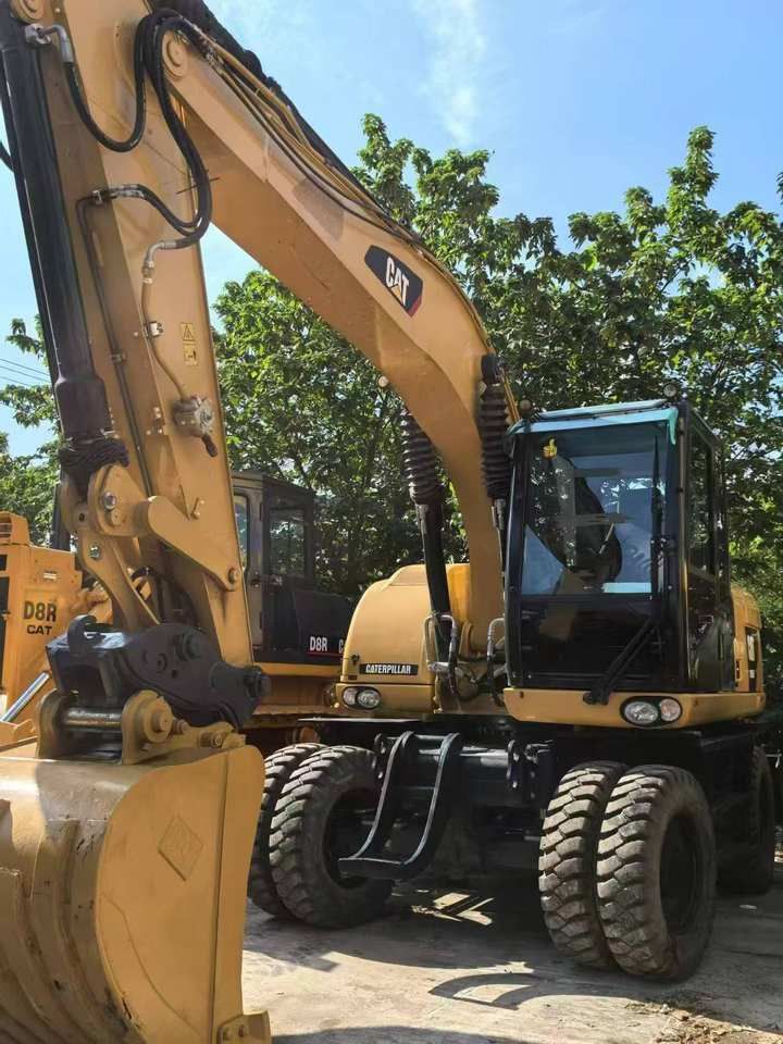 2019 Caterpillar M315D wheel excavator, front three-quarter view 2019 Caterpillar M315D wheel excavator, front three-quarter view