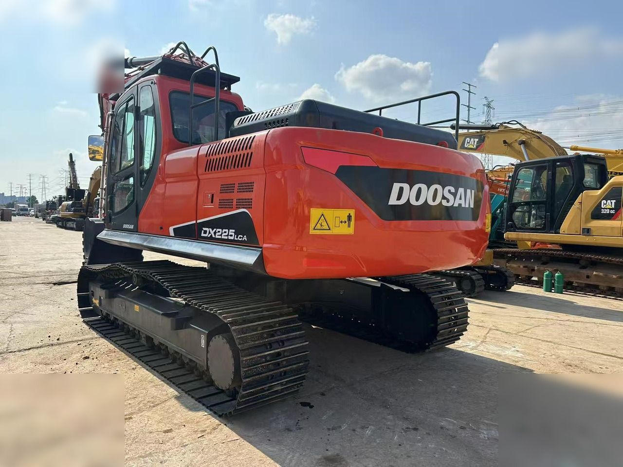 2020 Doosan DX225LCA crawler excavator rear three-quarter view 2020 Doosan DX225LCA crawler excavator rear three-quarter view