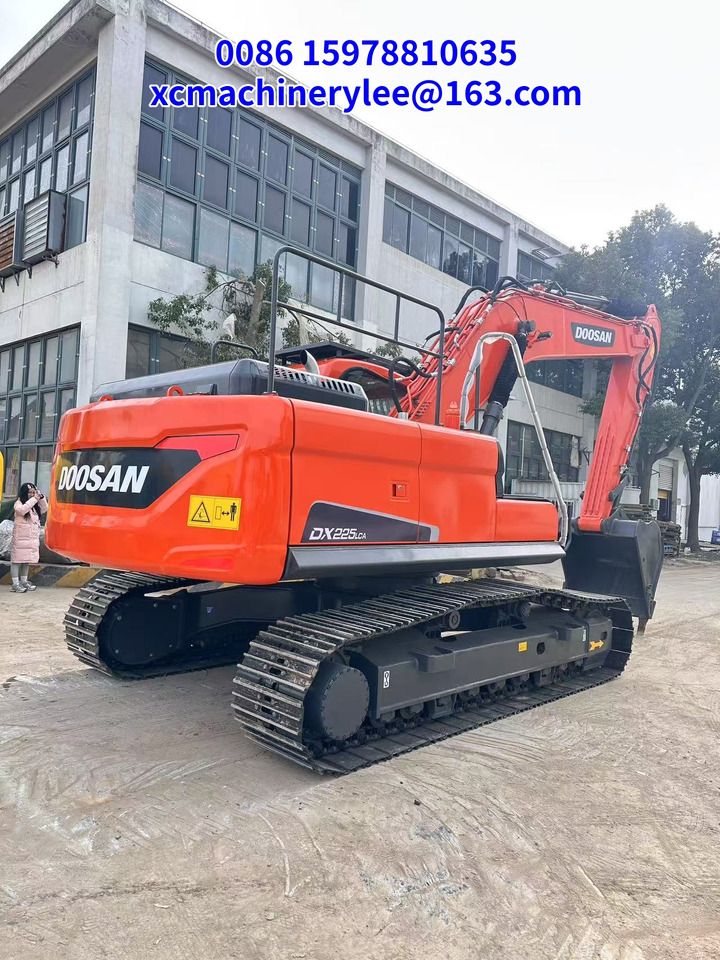 2023 Doosan DX225LCA crawler excavator, rear three-quarter view 2023 Doosan DX225LCA crawler excavator, rear three-quarter view