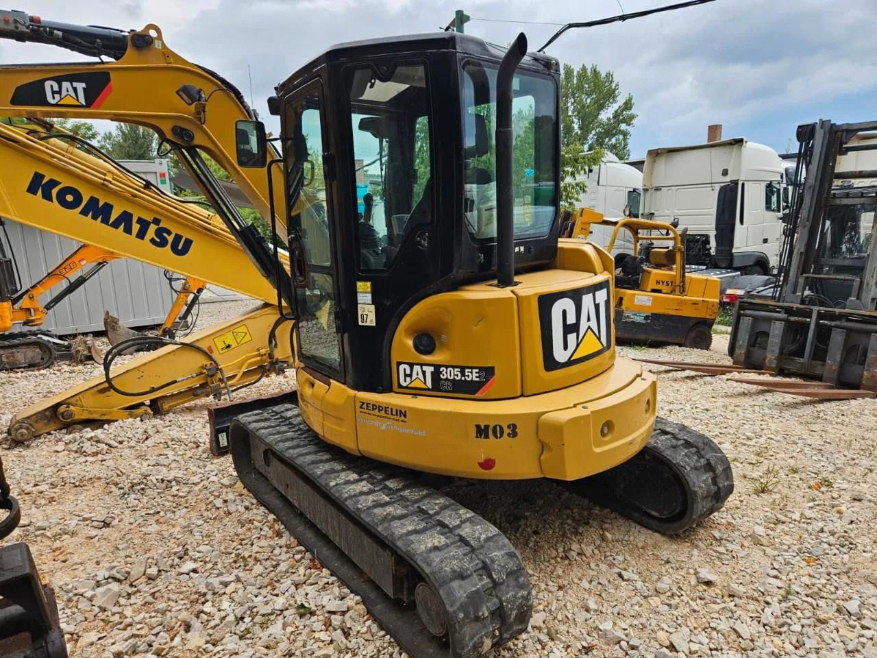 2018 Caterpillar 305.5E2 mini excavator, rear three-quarter view