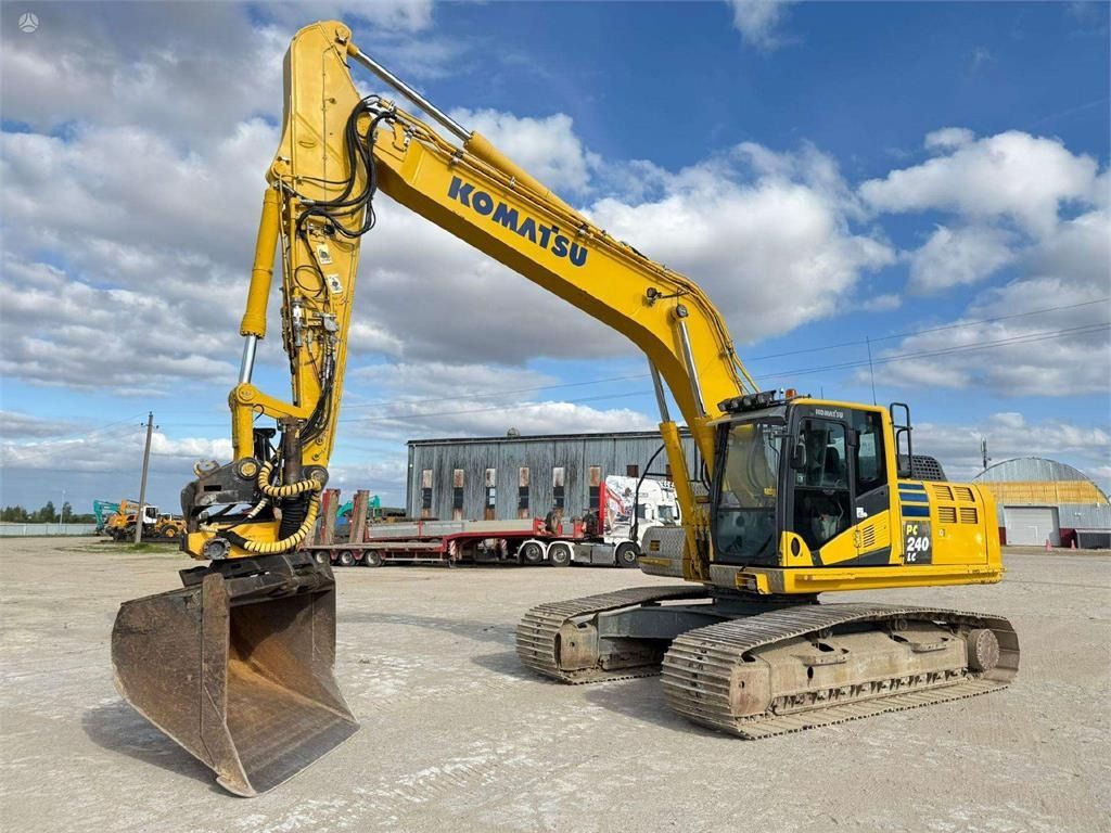 2012 Komatsu PC240LC-10 crawler excavator, front three-quarter view 2012 Komatsu PC240LC-10 crawler excavator, front three-quarter view