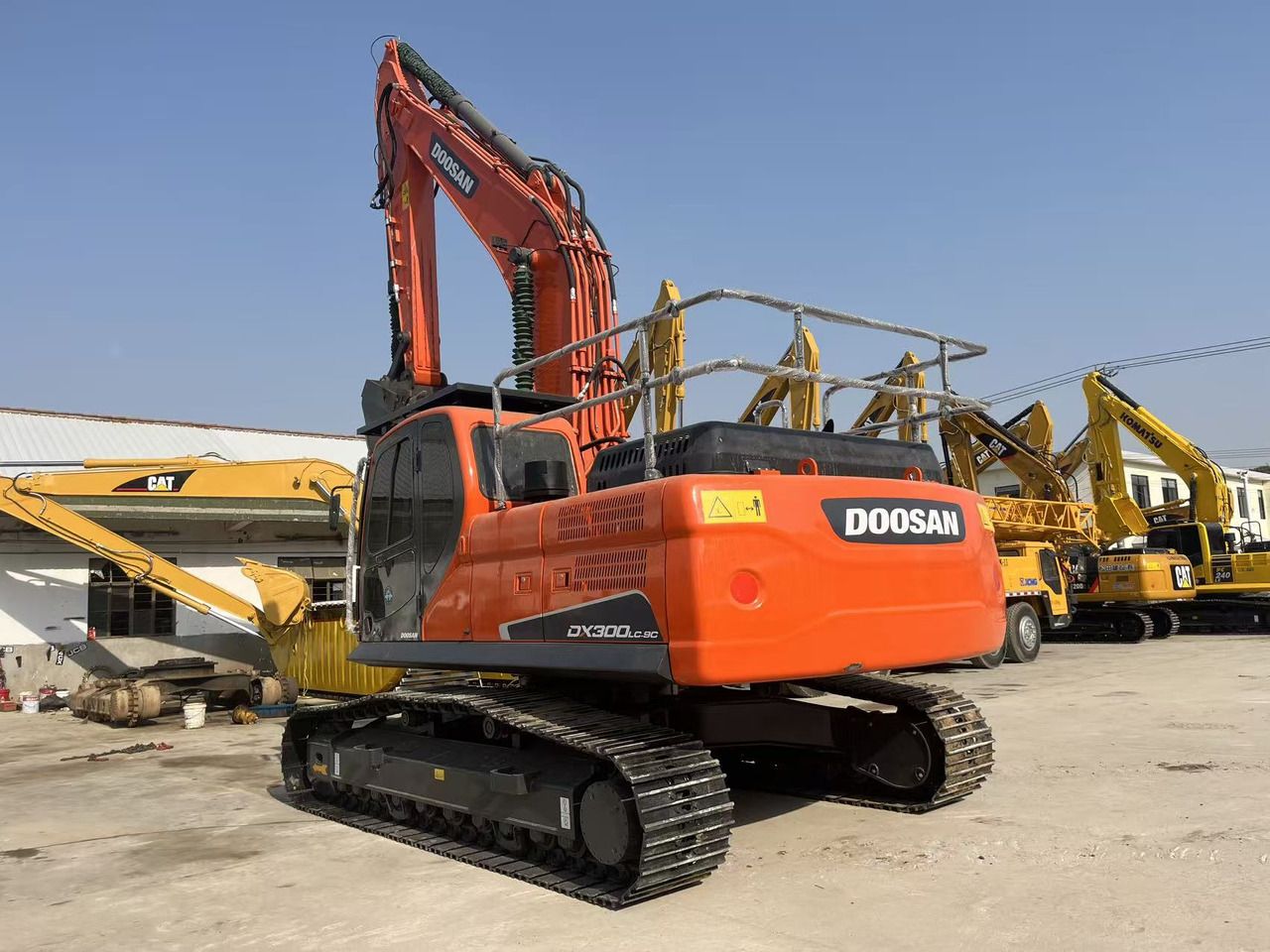 2023 Doosan DX300LC-9C crawler excavator, rear three-quarter view