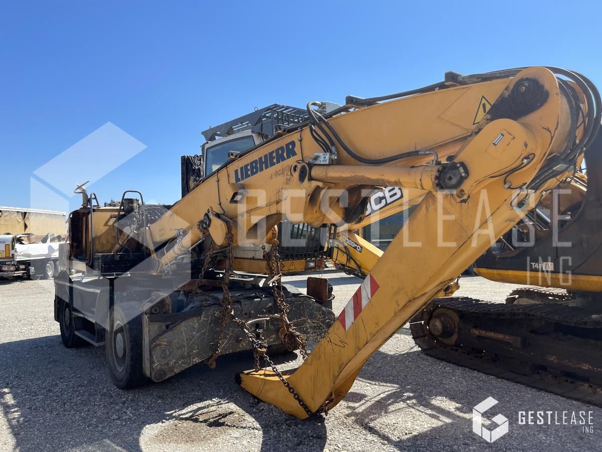 2010 Liebherr A316 wheel excavator, side view 2010 Liebherr A316 wheel excavator, side view