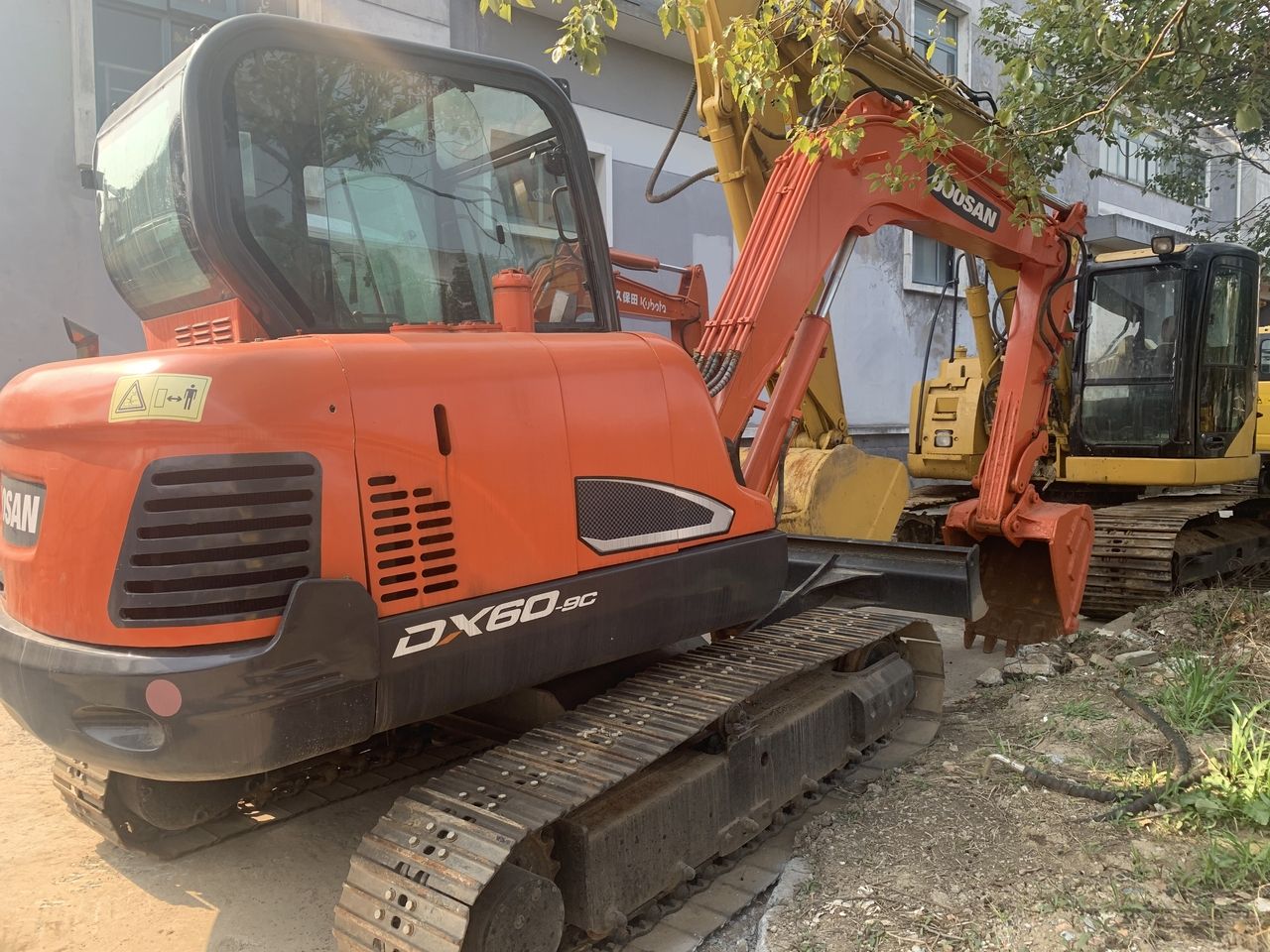 2011 Doosan DX60-9C mini excavator rear three-quarter view