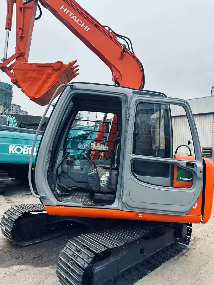 2023 Hitachi EX60 crawler excavator side view with open cab 2023 Hitachi EX60 crawler excavator side view with open cab