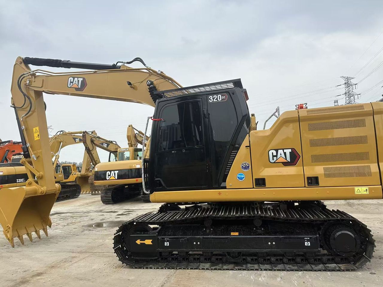 2023 Caterpillar 320GC crawler excavator side view 2023 Caterpillar 320GC crawler excavator side view