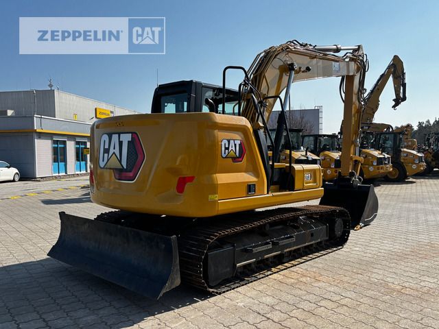 2021 Caterpillar 313-07B crawler excavator rear three-quarter view