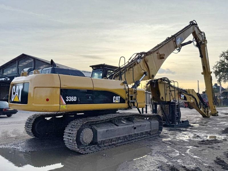 2011 Caterpillar 336D UHD crawler excavator, rear three-quarter view 2011 Caterpillar 336D UHD crawler excavator, rear three-quarter view