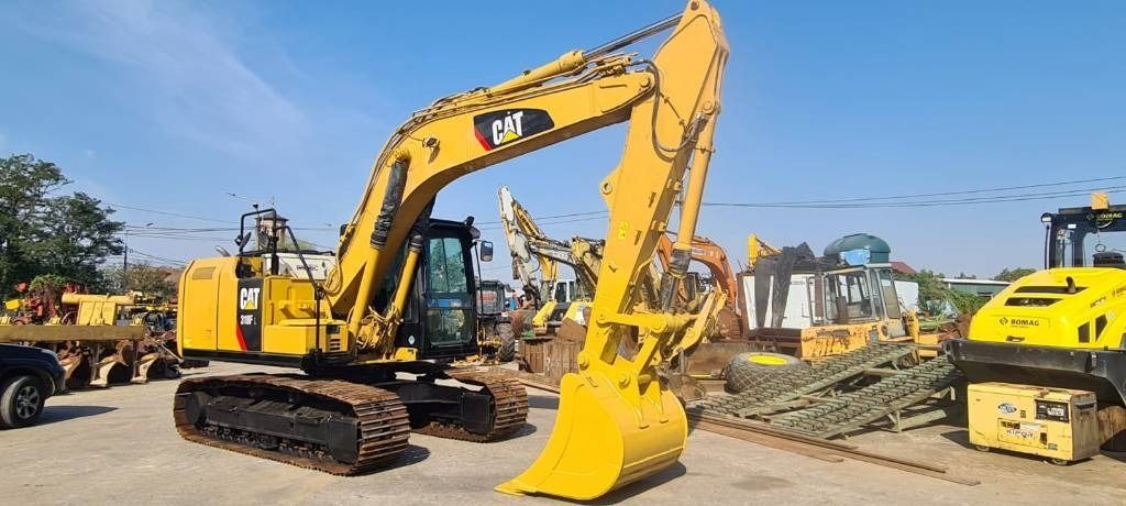 2020 Caterpillar 318FL crawler excavator, side view 2020 Caterpillar 318FL crawler excavator, side view