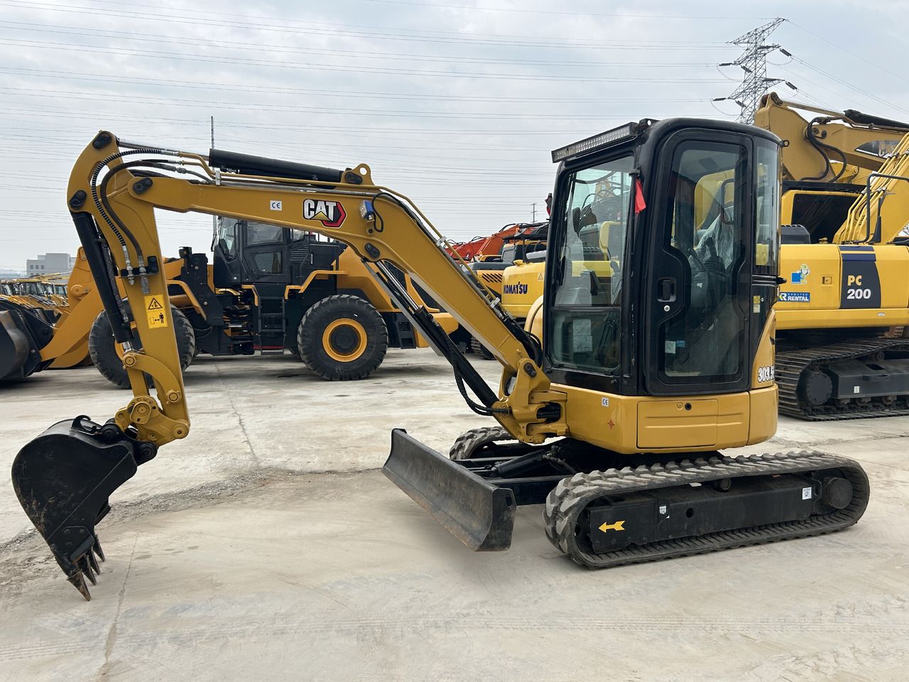 2024 Caterpillar 303.5ECR mini excavator side view