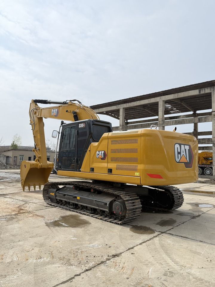 2023 Caterpillar 330GC crawler excavator, rear three-quarter view