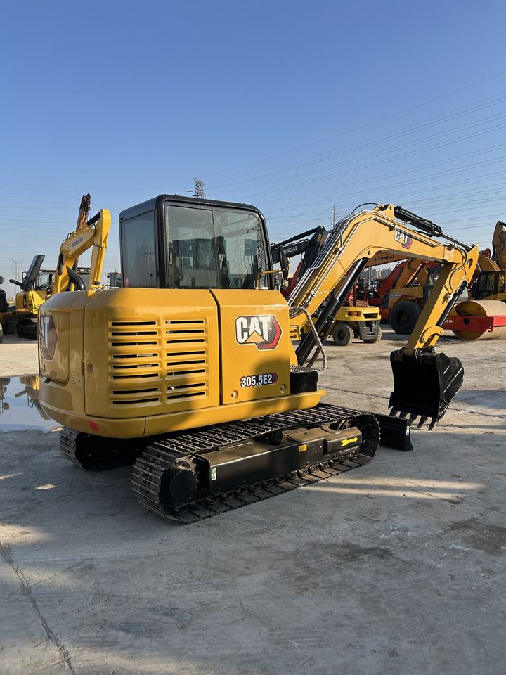 2024 Caterpillar 305.5E2 mini excavator, rear three-quarter view 2024 Caterpillar 305.5E2 mini excavator, rear three-quarter view