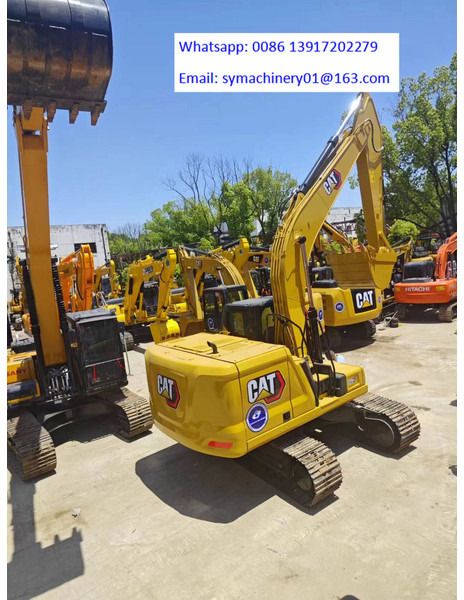 2023 Caterpillar 320GC crawler excavator, rear three-quarter view 2023 Caterpillar 320GC crawler excavator, rear three-quarter view