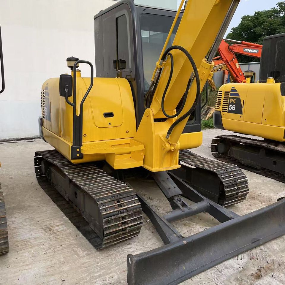2023 Komatsu PC56-7 mini excavator, rear three-quarter view 2023 Komatsu PC56-7 mini excavator, rear three-quarter view