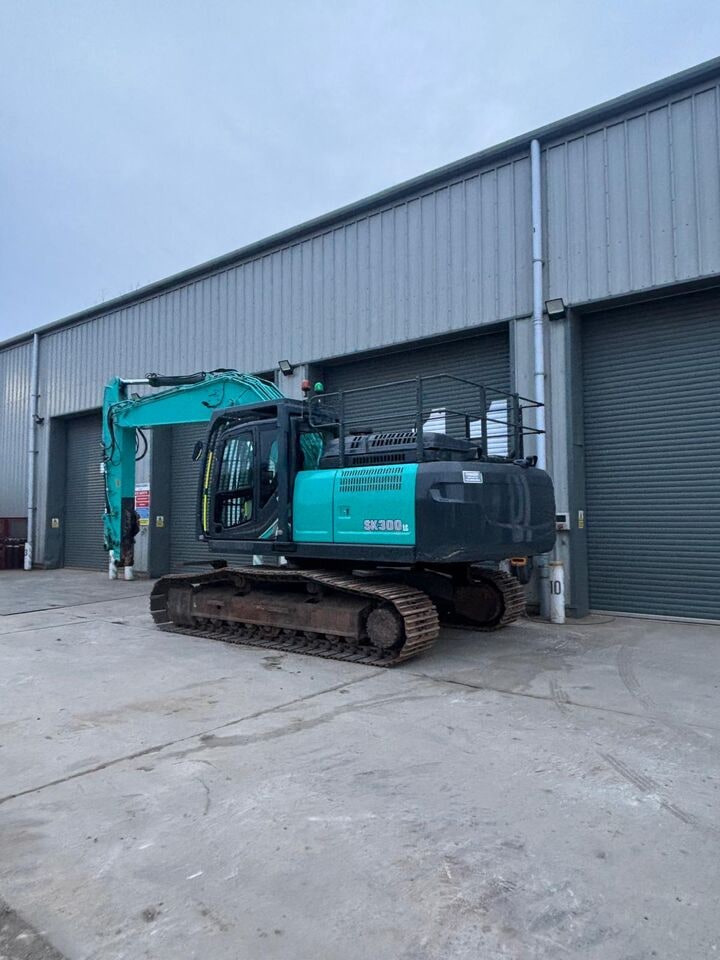 2021 Kobelco SK300LC crawler excavator, rear three-quarter view 2021 Kobelco SK300LC crawler excavator, rear three-quarter view
