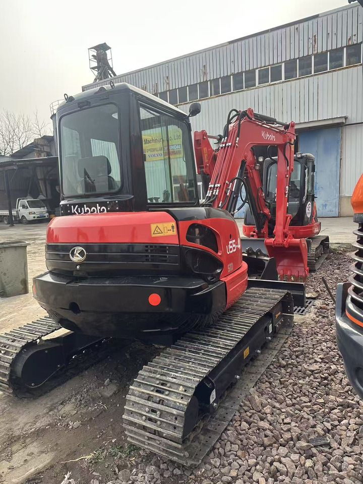 2024 Kubota U55-4 mini excavator, front three-quarter view