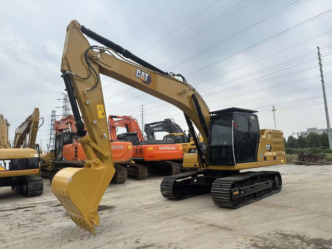 2023 Caterpillar 320GC crawler excavator, front three-quarter view 2023 Caterpillar 320GC crawler excavator, front three-quarter view