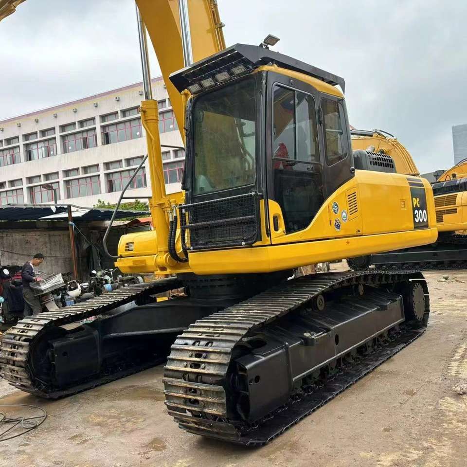 Komatsu PC300 crawler excavator, front three-quarter view Komatsu PC300 crawler excavator, front three-quarter view