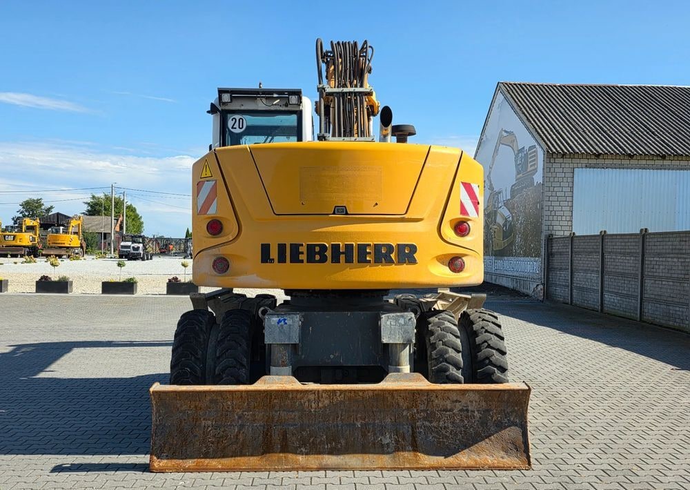 2014 Liebherr A918 COMPACT wheel excavator rear view 2014 Liebherr A918 COMPACT wheel excavator rear view
